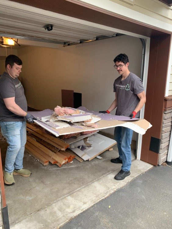 Evergreen Cleanup picking up drywall and construction debris
